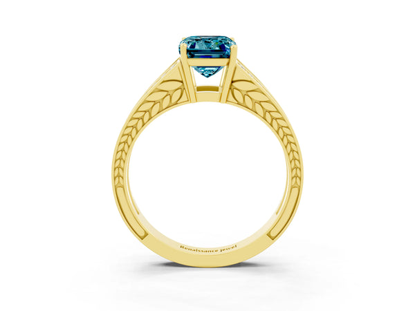 Yellow gold Emerald Cut Blue Topaz Split Shank Ring with Pavé Band and Four-Prong Setting
