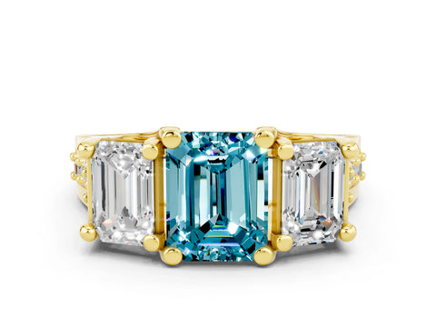 Yellow gold Emerald Cut Blue Topaz Three-Stone Ring with Channel Set Band and Four-Prong Setting