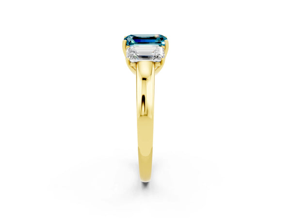 Yellow gold Emerald Cut Blue Topaz Three-Stone Ring with Four-Prong Setting and Classic Band