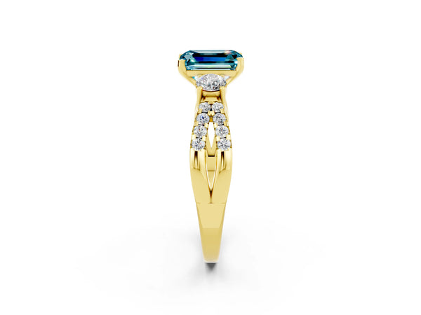 Yellow gold Emerald Cut Blue Topaz Three-Stone Ring with Pavé Split Shank and Four-Prong Setting