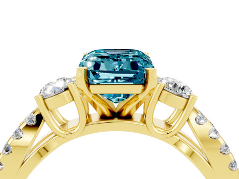 Yellow gold Emerald Cut Blue Topaz Three-Stone Ring with Pavé Split Shank and Four-Prong Setting_4
