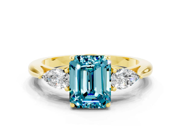 Yellow gold Emerald Cut Blue Topaz Three-Stone Ring with Pear  Side Stones and Prong Setting