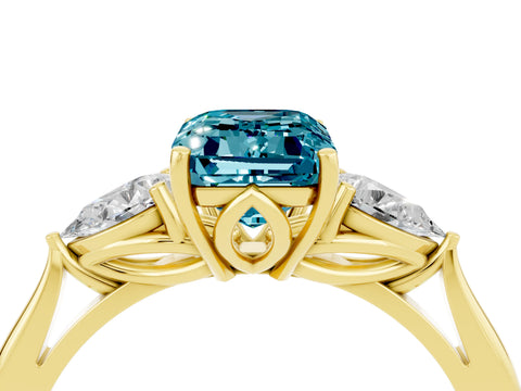 Yellow gold Emerald Cut Blue Topaz Three-Stone Ring with Pear Side Stones and Four-Prong Setting_16