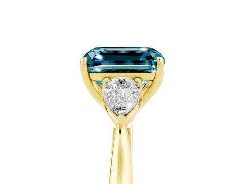 Yellow gold Emerald Cut Blue Topaz Three-Stone Ring with Pear Side Stones and Four-Prong Setting_17