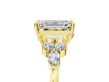 Yellow gold Emerald Cut Brilliant Diamond Solitaire Ring with Pear Side Stones and Four-Prong Setting_8
