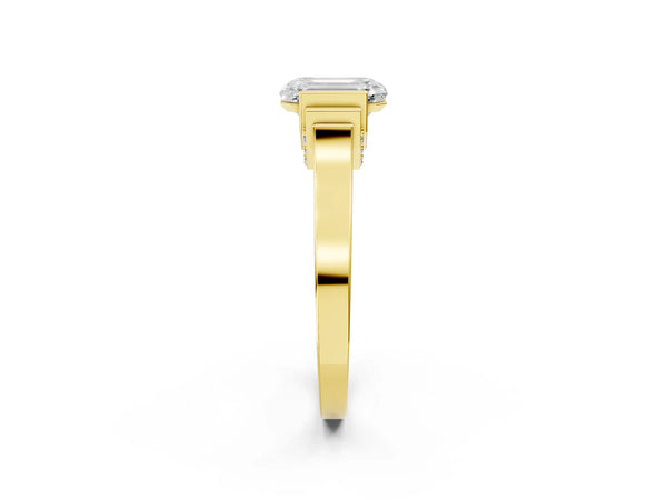 Yellow gold Emerald Cut Brilliant Solitaire Diamond Ring with Channel Set Band and Bar Prong Setting
