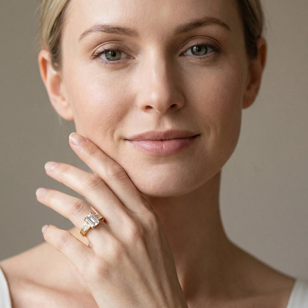 Yellow gold Emerald Cut Channel Set Solitaire Ring with Four-Prong Setting