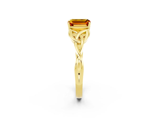 Yellow gold Emerald Cut Citrine Solitaire Celtic Knot Ring with Four-Prong Setting