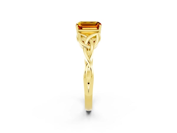 Yellow gold Emerald Cut Citrine Solitaire Engagement Ring with Celtic Knot Band and Four-Prong Setting