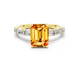 Yellow gold Emerald Cut Citrine Solitaire with Side Baguettes and Channel Set Band