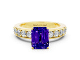 Yellow gold Emerald Cut Cut Channel Set Diamond Engagement Ring with Four-Prong Setting