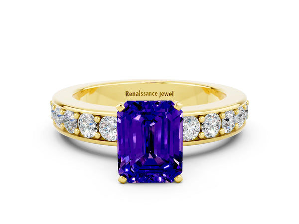 Yellow gold Emerald Cut Tanzanite Engagement Ring with Channel Set Round  Band and Prong Setting