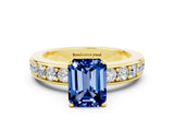 Yellow gold Emerald Cut Cut Channel Set Diamond Engagement Ring with Four-Prong Setting