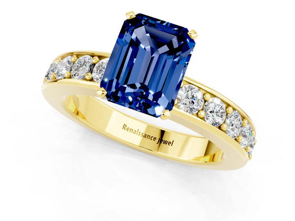 Yellow gold Emerald Cut Blue Sapphire Engagement Ring with Channel Set Round  Band and Prong Setting