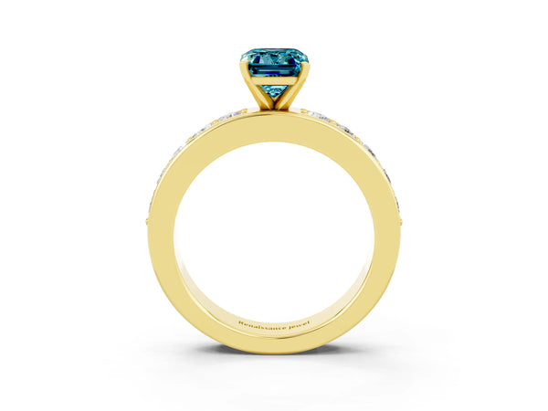 Yellow gold Emerald Cut Blue Topaz Engagement Ring with Channel Set Round  Band and Prong Setting
