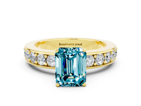 Yellow gold Emerald Cut Blue Topaz Engagement Ring with Channel Set Round  Band and Prong Setting