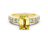 Yellow gold Emerald Cut Cut Channel Set Diamond Engagement Ring with Four-Prong Setting