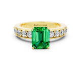 Yellow gold Emerald Cut Cut Channel Set Diamond Engagement Ring with Four-Prong Setting
