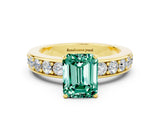 Yellow gold Emerald Cut Cut Channel Set Diamond Engagement Ring with Four-Prong Setting