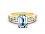 Yellow gold Emerald Cut Cut Channel Set Diamond Engagement Ring with Four-Prong Setting