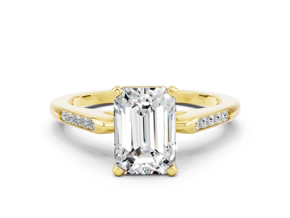 Yellow gold Emerald Cut Cut Channel Set Solitaire Engagement Ring with Four-Prong Setting