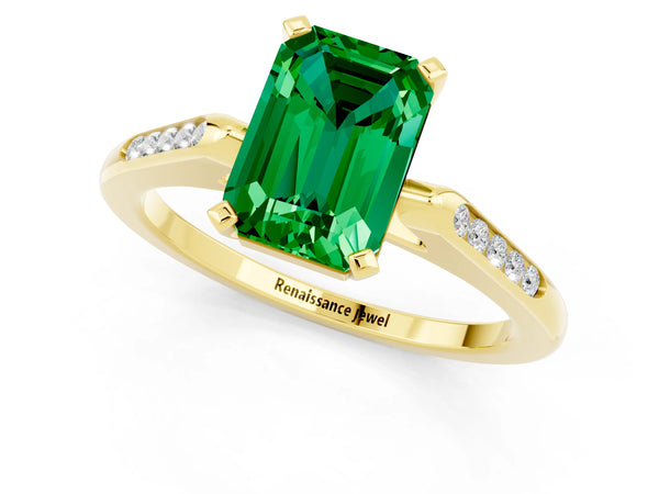 Yellow gold Emerald Cut Emerald Solitaire Ring with Channel Set Round  Band and Prong Setting