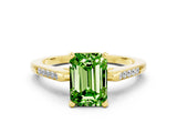 Yellow gold Emerald Cut Cut Channel Set Solitaire Engagement Ring with Four-Prong Setting
