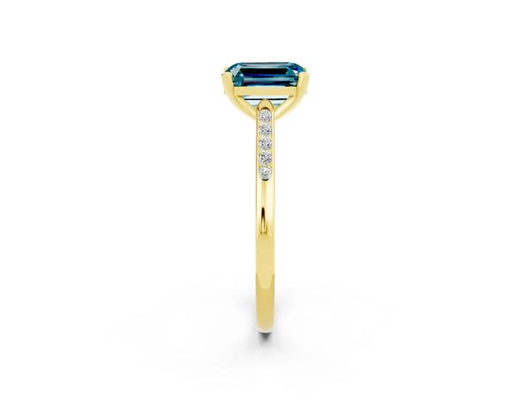 Yellow gold Emerald Cut Blue Topaz Solitaire Ring with Channel Set Round  Band and Prong Setting