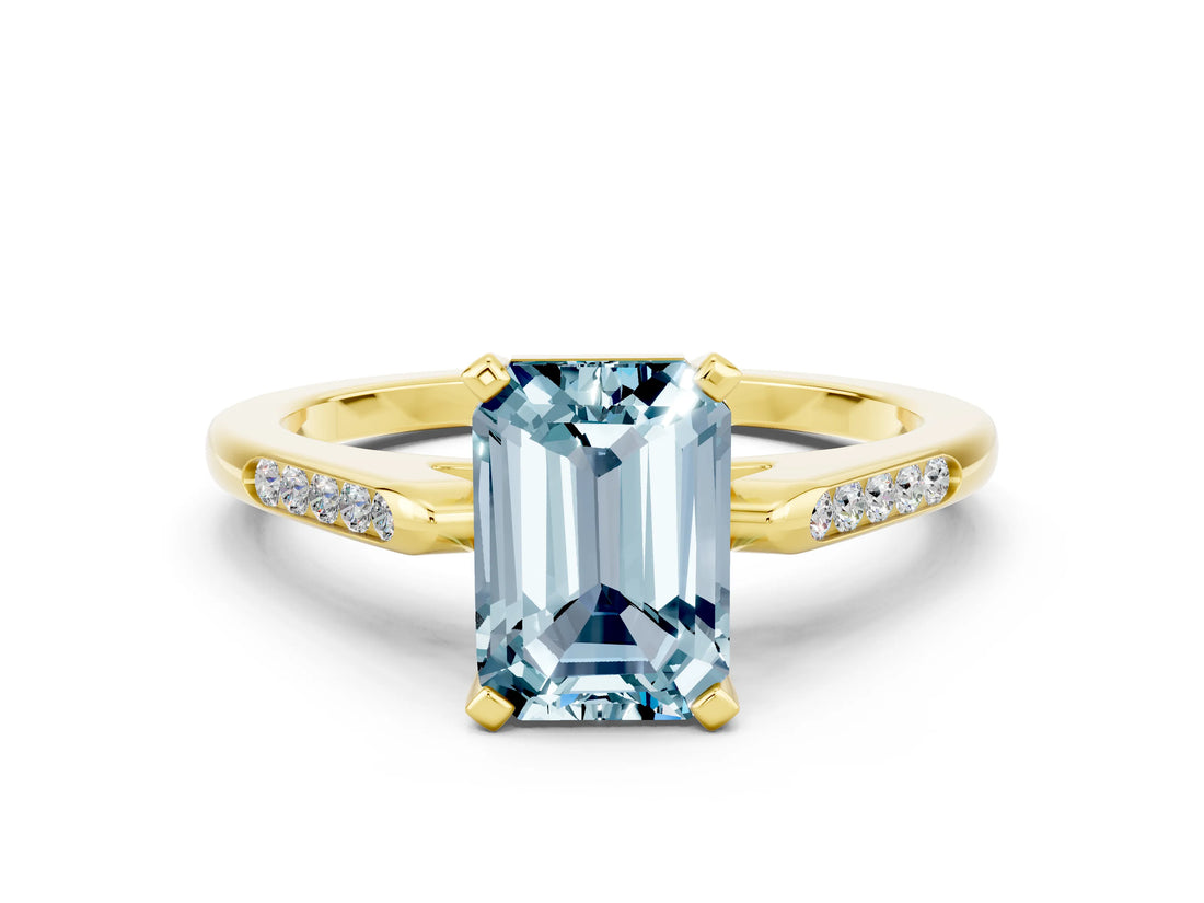 Yellow gold Emerald Cut Cut Channel Set Solitaire Engagement Ring with Four-Prong Setting