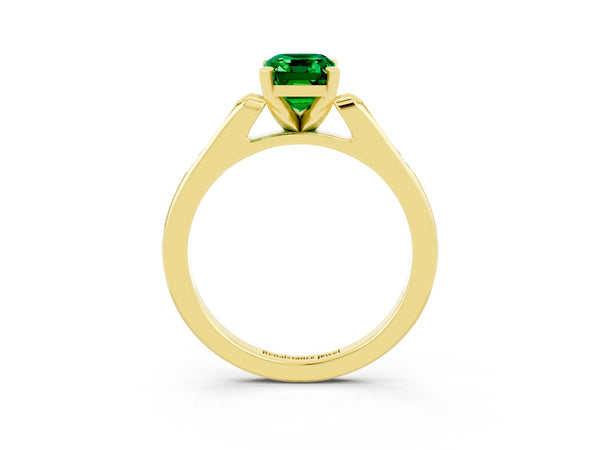 Yellow gold Emerald Cut Emerald Solitaire Ring with Channel Set Round  Band and Prong Setting