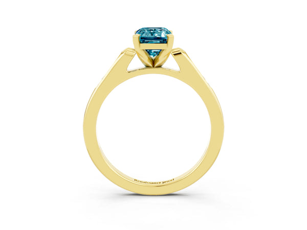 Yellow gold Emerald Cut Blue Topaz Solitaire Ring with Channel Set Round  Band and Prong Setting