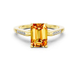 Yellow gold Emerald Cut Cut Channel Set Solitaire Engagement Ring with Four-Prong Setting