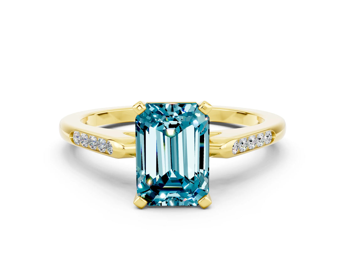 Yellow gold Emerald Cut Cut Channel Set Solitaire Engagement Ring with Four-Prong Setting
