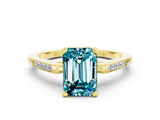 Yellow gold Emerald Cut Cut Channel Set Solitaire Engagement Ring with Four-Prong Setting