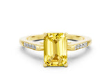 Yellow gold Emerald Cut Cut Channel Set Solitaire Engagement Ring with Four-Prong Setting