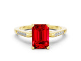 Yellow gold Emerald Cut Cut Channel Set Solitaire Engagement Ring with Four-Prong Setting