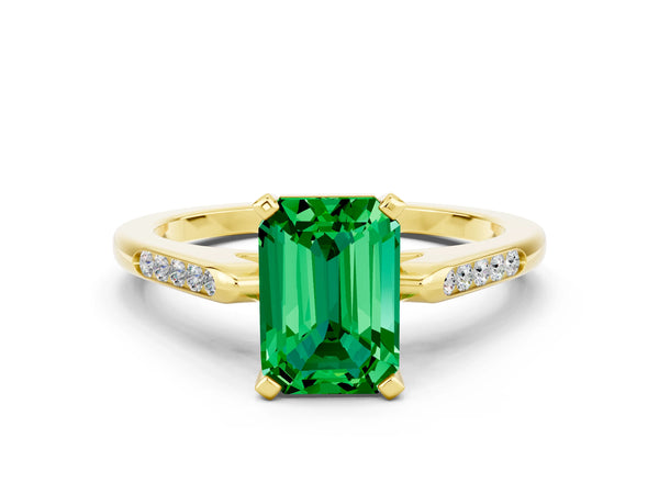 Yellow gold Emerald Cut Emerald Solitaire Ring with Channel Set Round  Band and Prong Setting