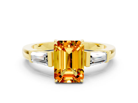 Yellow gold Emerald Cut Cut Diamond Ring with Tapered Baguette Side Stones in Four-Prong Setting
