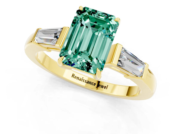 Yellow gold Emerald Cut Green Sapphire Three-Stone Ring with Tapered Baguette Side Stones and Prong Setting