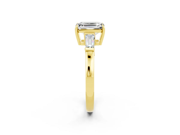 Yellow gold Emerald Cut Moissanite Three-Stone Ring with Tapered Baguette Side Stones and Prong Setting