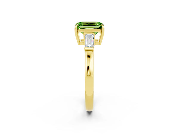Yellow gold Emerald Cut Cut Diamond Ring with Tapered Baguette Side Stones in Four-Prong Setting
