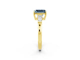 Yellow gold Emerald Cut Cut Diamond Ring with Tapered Baguette Side Stones in Four-Prong Setting_2