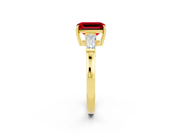 Yellow gold Emerald Cut Cut Diamond Ring with Tapered Baguette Side Stones in Four-Prong Setting