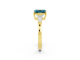 Yellow gold Emerald Cut Cut Diamond Ring with Tapered Baguette Side Stones in Four-Prong Setting_2