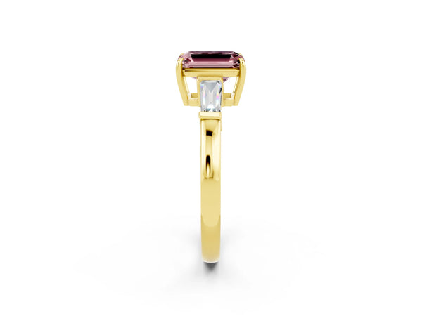 Yellow gold Emerald Cut Cut Diamond Ring with Tapered Baguette Side Stones in Four-Prong Setting
