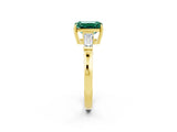 Yellow gold Emerald Cut Cut Diamond Ring with Tapered Baguette Side Stones in Four-Prong Setting_2
