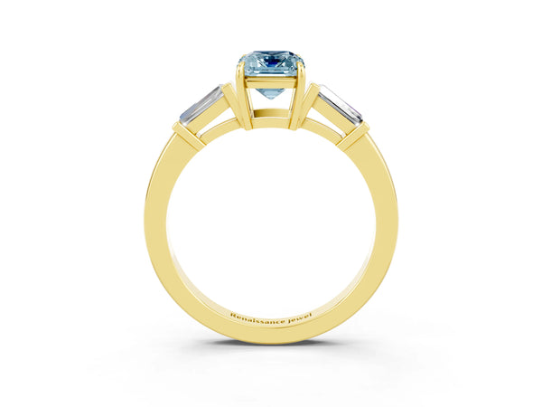 Yellow gold Emerald Cut Aquamarine Three-Stone Ring with Tapered Baguette Side Stones and Prong Setting