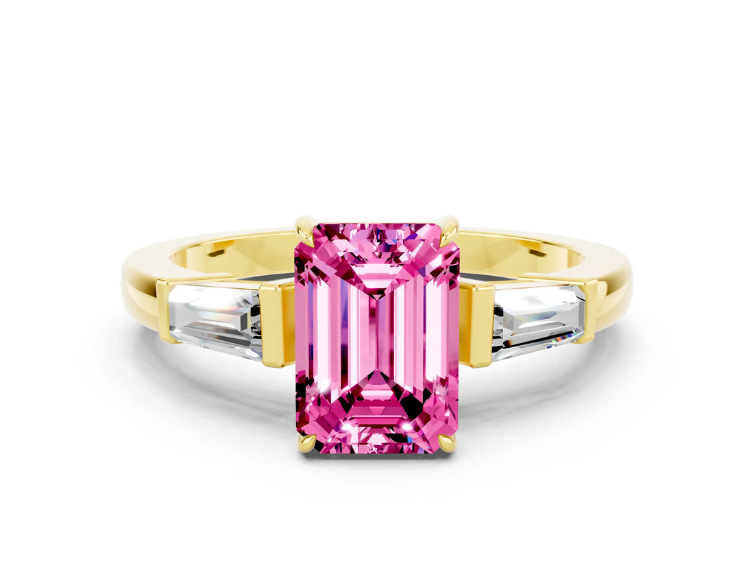 Yellow gold Emerald Cut Cut Diamond Ring with Tapered Baguette Side Stones in Four-Prong Setting
