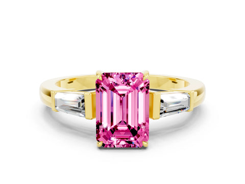Yellow gold Emerald Cut Cut Diamond Ring with Tapered Baguette Side Stones in Four-Prong Setting