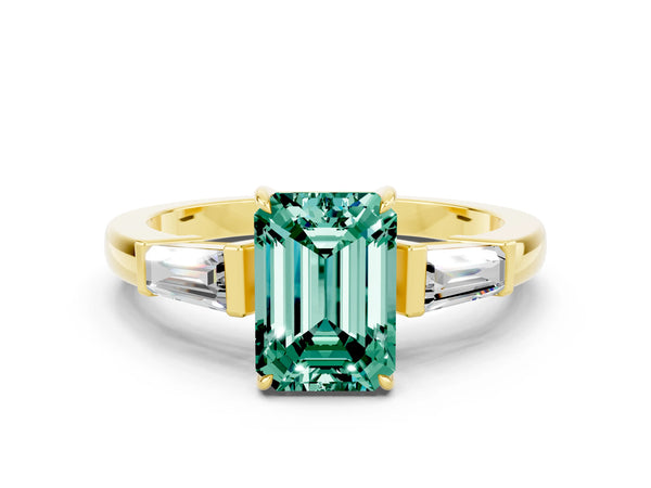 Yellow gold Emerald Cut Green Sapphire Three-Stone Ring with Tapered Baguette Side Stones and Prong Setting